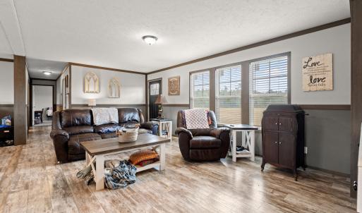 Living room featuring a textured ceiling, ornament