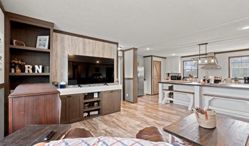 Living room with light wood-type flooring, a textu
