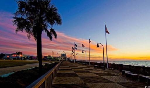 View of home's community with a water view