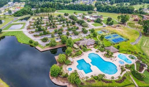 Aerial view of residential area with a pool and a