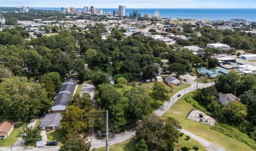 View of property location featuring nearby urban a