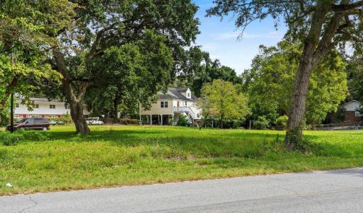 View of yard featuring view of wooded area