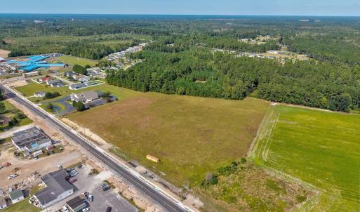 Aerial view of property and surrounding area featu