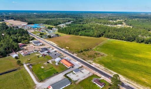 Aerial view of property and surrounding area featu