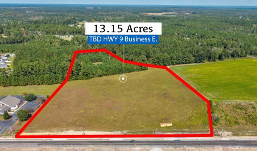 Aerial view of property and surrounding area featu