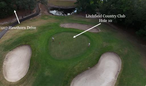 Aerial view of property's location featuring a lar