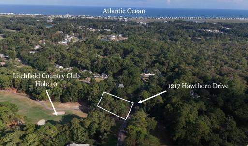 Aerial view of property and surrounding area featu