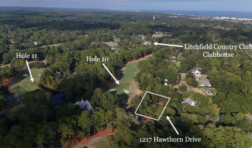 Aerial view of property and surrounding area featu