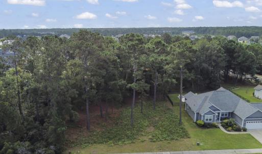 Aerial view of property and surrounding area featu