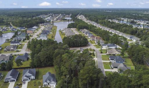 Aerial view of property and surrounding area featu