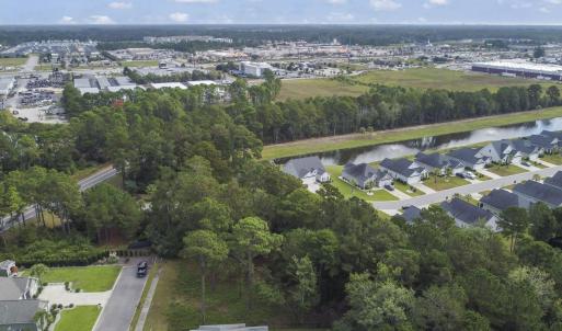 View of property location with a nearby body of wa