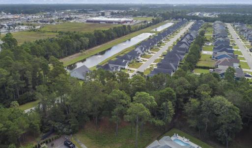 View of property location with a nearby body of wa
