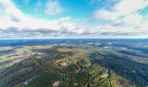 Aerial view of property and surrounding area featu