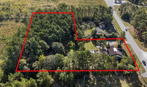 Aerial view of property and surrounding area featu