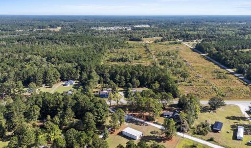 Aerial view of property and surrounding area featu