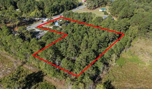 Aerial view of property's location with property p