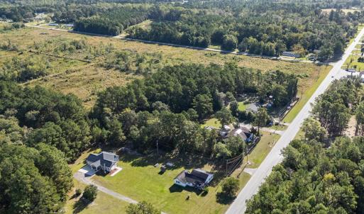View of property location with a forest