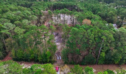 Aerial overview of property's location with a fore