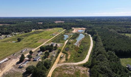 Aerial view of property's location featuring a for