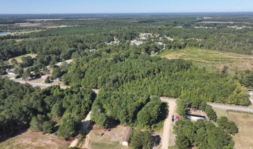 Aerial overview of property's location with a heav