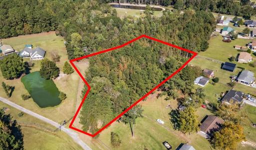 Aerial view of residential area featuring a nearby