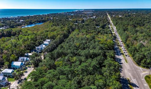 Aerial view of property's location with a large bo
