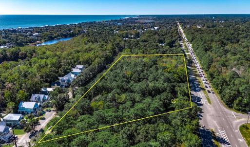 Aerial view of property's location with a large bo