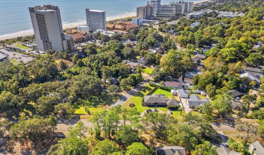 View of urban area featuring expansive beach