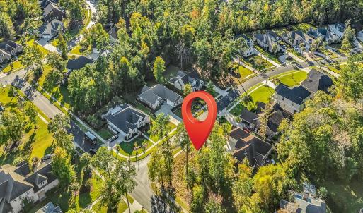 Aerial view of property and surrounding area with