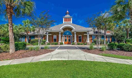 Exercise room featuring light wood-type flooring