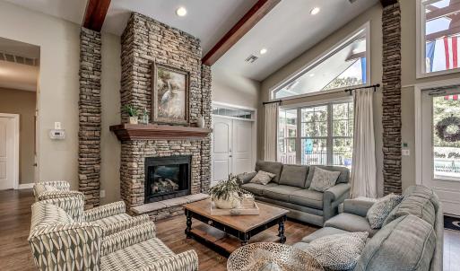 Dining room with beam ceiling, french doors, high