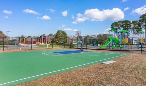 View of basketball court with community basketball