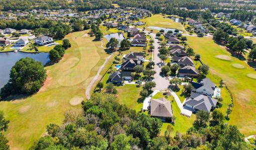Aerial view of residential area with a golf course