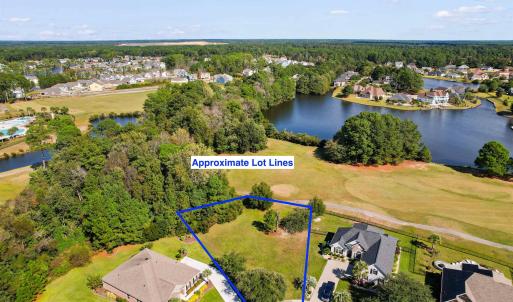 Aerial view of residential area featuring a nearby