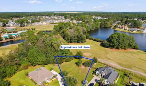 Aerial view of residential area featuring a nearby