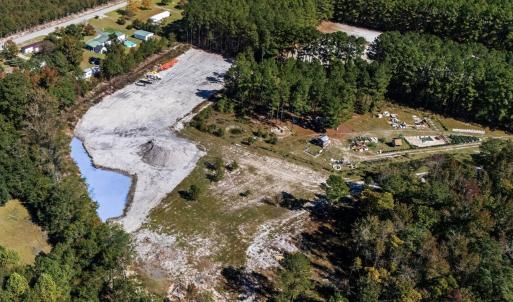Aerial view of property's location with a large bo