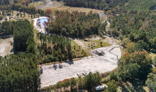 View of property location featuring a heavily wood