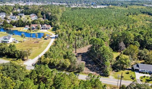 Drone / aerial view of a large body of water and a