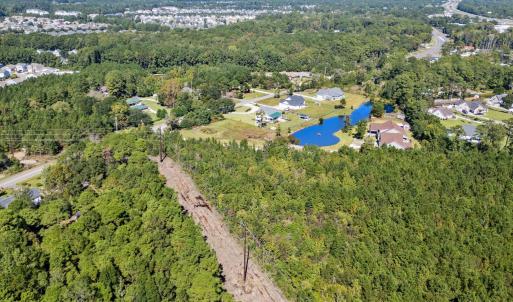 Aerial overview of property's location with a larg