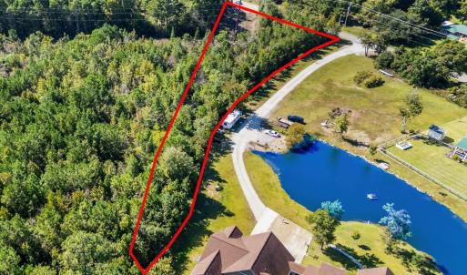 Aerial overview of property's location with a larg