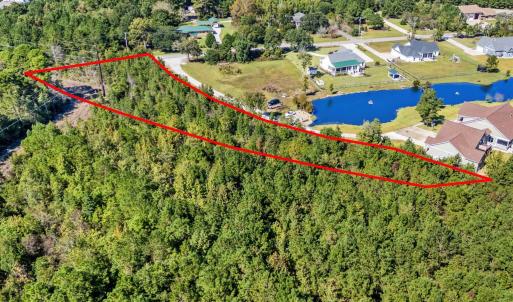 Aerial view of property and surrounding area featu