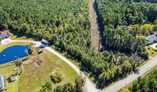 Aerial view of property and surrounding area with