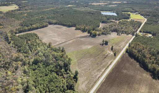 View of property location featuring a heavily wood