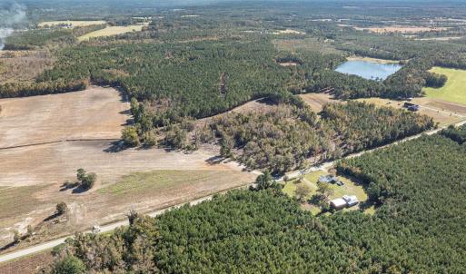 Aerial view of property and surrounding area with