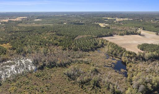 Bird's eye view of a nearby body of water and a he