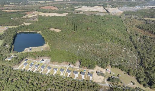 Aerial view of property and surrounding area with