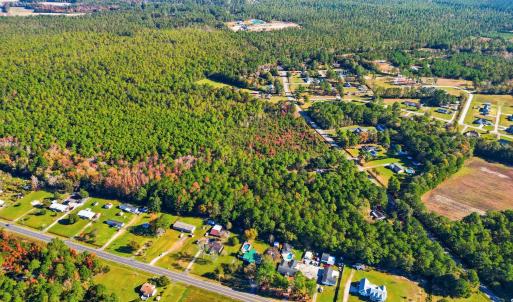 View of property location featuring a heavily wood