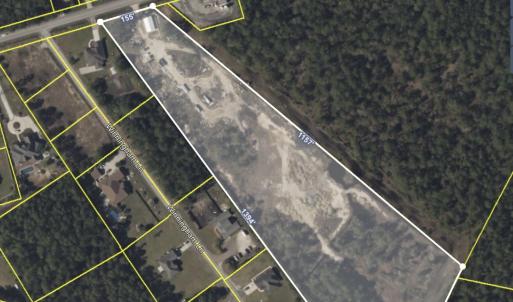 Aerial map of property and surrounding area featur