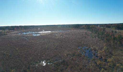 View of undeveloped land featuring a nearby body o