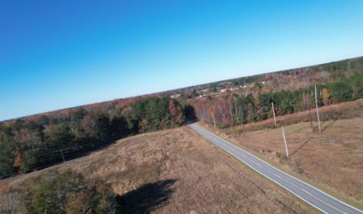 Aerial view of property's location with a heavily